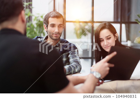 shirt shows a report to colleagues at work shirt shows a report to colleagues at work 104940831