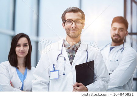 A view of a happy medical team of doctors, man and women A view of a happy medical team of doctors, man and women 104940921