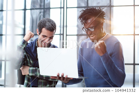 Business people talking near glass wall in office 104941332