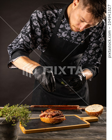 Cooking steak burger concept 104941827