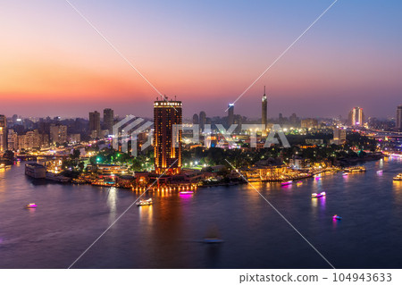 Cairo downtown, view of the Nile and the skyscrappers at night, Egypt Cairo downtown, view of the Nile and the skyscrappers at night, Egypt 104943633