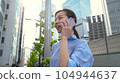 Image of talking on a smartphone 104944637