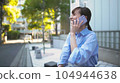 Jinbutsu talking on smartphone 104944638