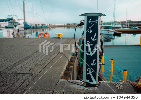 A water source for boats standing on a dock. Water source on dock at a pier near sea. Sopot, Poland 104944850