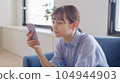 woman holding a smartphone 104944903
