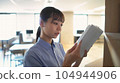 person reading a book 104944906