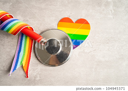 Stethoscope with heart and rainbow flag, symbol of LGBT pride month celebrate annual in June social, symbol of gay, lesbian, bisexual, transgender, human rights and peace. 104945371