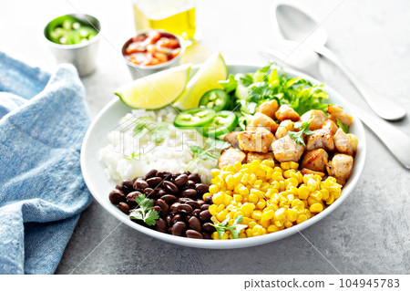 Chipotle spicy chicken with rice corn, beans Chipotle spicy chicken with rice corn, beans 104945783