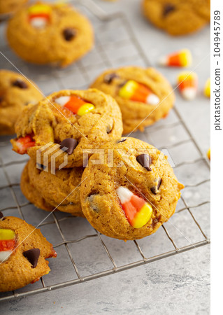 Candy corn and chocolate pumpkin cookies 104945789