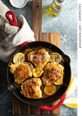 Lemon herb roasted chicken 104945793