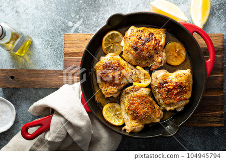 Lemon herb roasted chicken 104945794