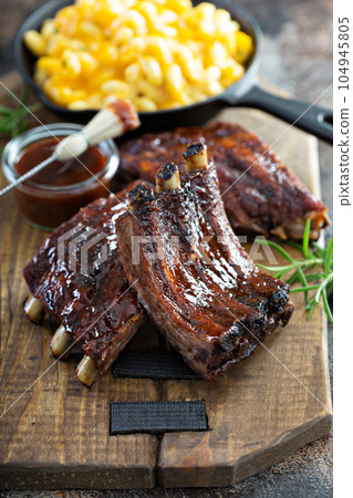 Grilled bbq ribs with sauce Grilled bbq ribs with sauce 104945805