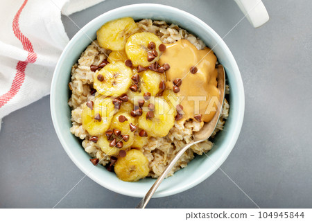 Oatmeal with caramelized bananas Oatmeal with caramelized bananas 104945844