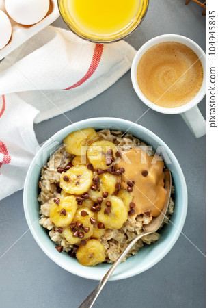 Oatmeal with caramelized bananas Oatmeal with caramelized bananas 104945845