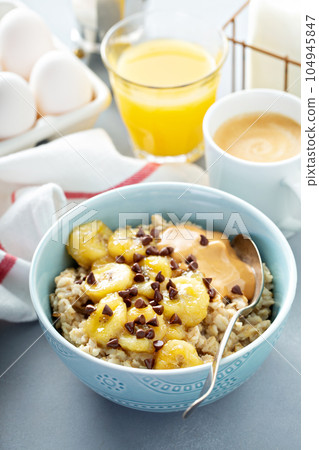 Oatmeal with caramelized bananas Oatmeal with caramelized bananas 104945847