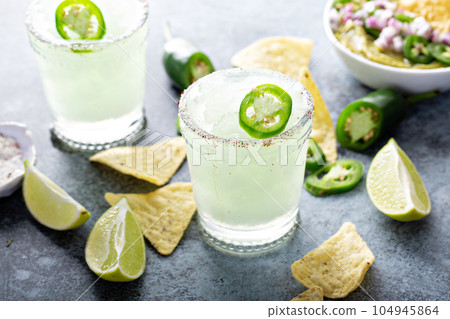 Salted rim margarita 104945864