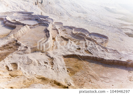 Travertines mountains of Pamukkale in Turkey. 104946297