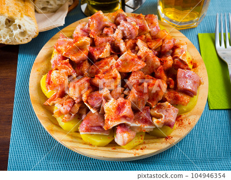 Spanish dish - roasted pig ears Spanish dish - roasted pig ears 104946354