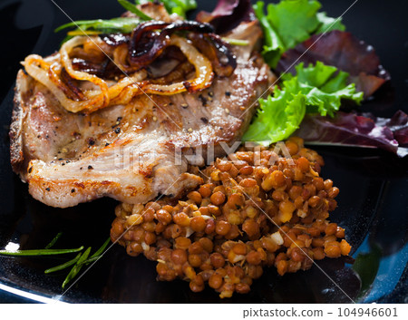 Appetizing roasted pork chop 104946601