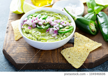 Guacamole with red onion and Jalapeno pepper Guacamole with red onion and Jalapeno pepper 104946606