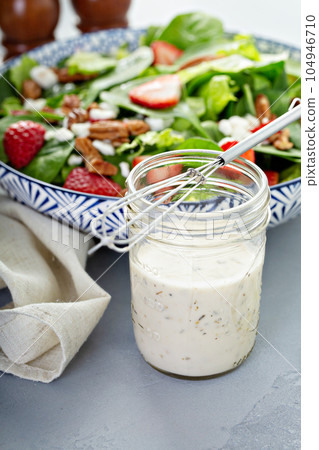 Homemade ranch dressing in a glass jar Homemade ranch dressing in a glass jar 104946710