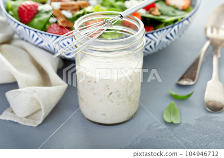 Homemade ranch dressing in a glass jar 104946712