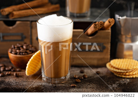 Coffee latte with thin waffles 104946822