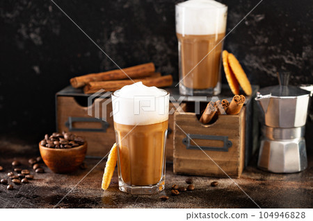 Coffee latte in small glasses Coffee latte in small glasses 104946828
