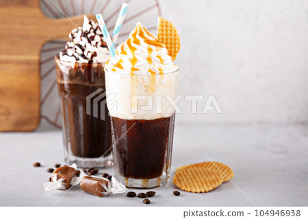 Coffee cocktails with whipped cream 104946938