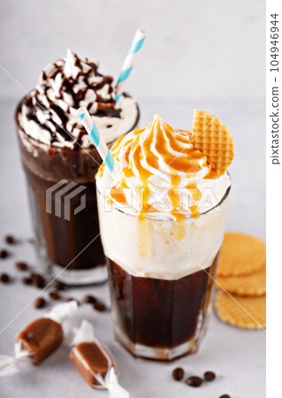 Coffee cocktails with whipped cream 104946944