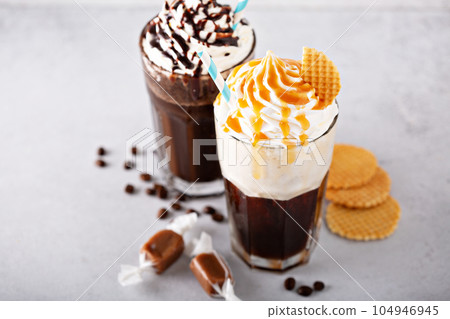 Coffee cocktails with whipped cream 104946945