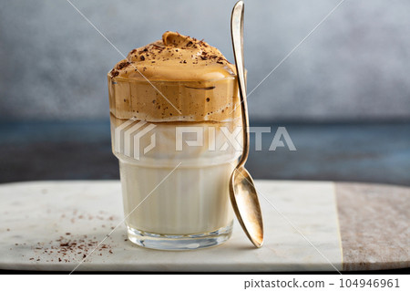 Dalgona coffee or whipped instant coffee Dalgona coffee or whipped instant coffee 104946961