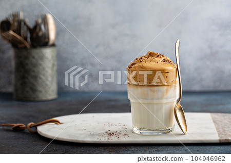 Dalgona coffee or whipped instant coffee 104946962