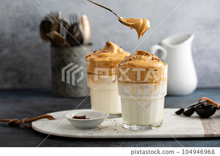 Dalgona coffee or whipped instant coffee 104946968