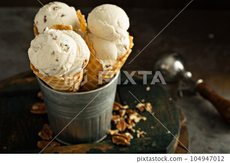Homemade caramel pecan ice cream cones Homemade caramel pecan ice cream cones 104947012