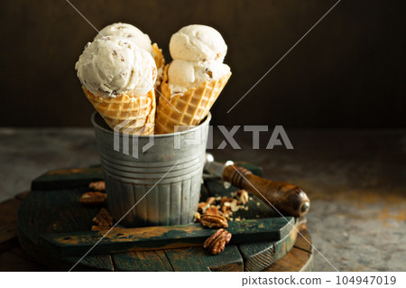 Homemade caramel pecan ice cream cones Homemade caramel pecan ice cream cones 104947019