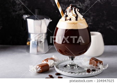 Coffee mocha with chocolate syrup 104947025