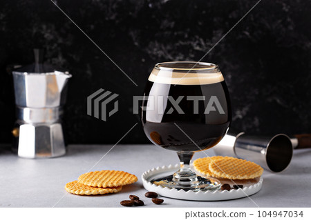 Irish coffee in a glass Irish coffee in a glass 104947034