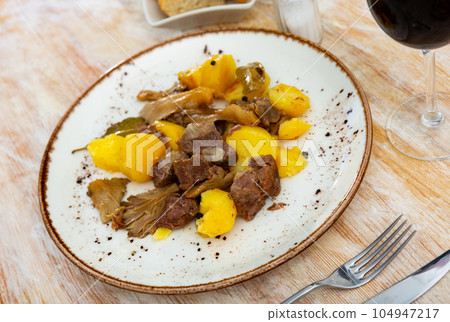 Traditional dish of French cuisine is Beef bourguignon 104947217