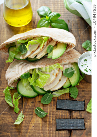 Healthy pita sandwich with chicken 104947619