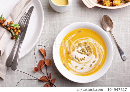 Pumpkin soup with cream 104947817