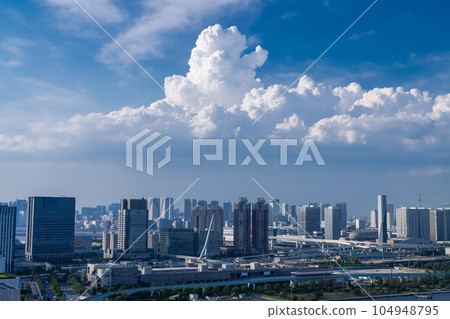 "Tokyo" Midsummer Tokyo cityscape, thunderheads in the sky 104948795