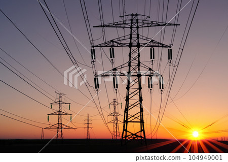 High voltage tower. High voltage. Electricity transmission power lines at sunset (high voltage pylon). High voltage circuit breaker in a power substation. Aerial view of high voltage power lines. High voltage tower. High voltage. Electricity transmission power lines at sunset (high voltage pylon). High voltage circuit breaker in a power substation. Aerial view of high voltage power lines. 104949001