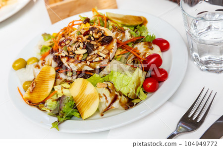 Portion of goat cheese salad Portion of goat cheese salad 104949772