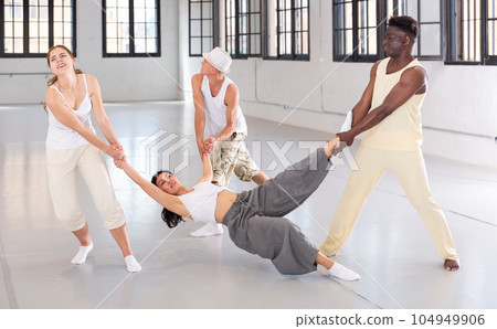 Four artists rehearsing spectacle scene Four artists rehearsing spectacle scene 104949906