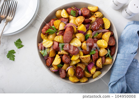 Traditional breakfast dish, potatoes with sausage 104950008