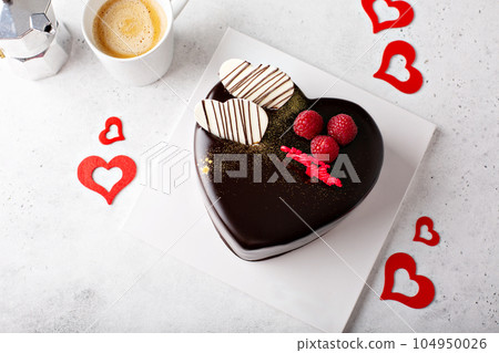 Dark chocolate Valentines day cake 104950026
