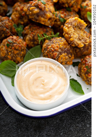 Sauasage balls with cheese and sauce Sauasage balls with cheese and sauce 104950102