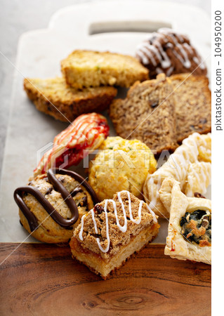 Variety of small pastries for breakfast 104950200