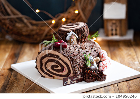 Yule log roll cake for Christmas 104950240